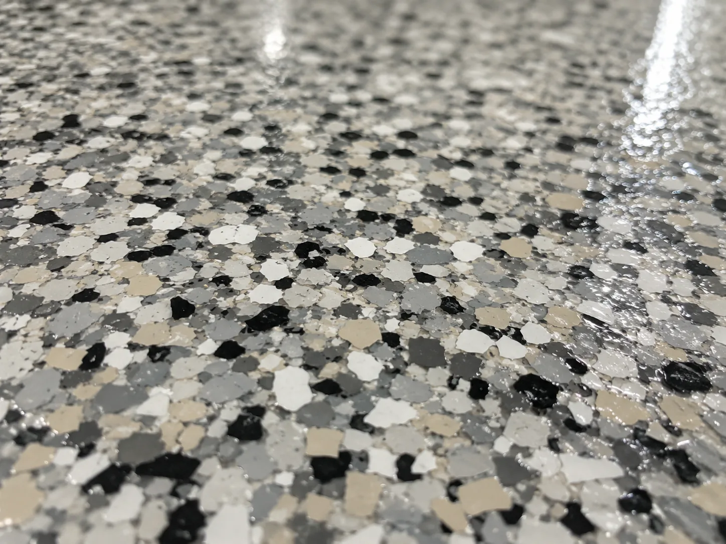 Close up of flake texture under clear topcoat